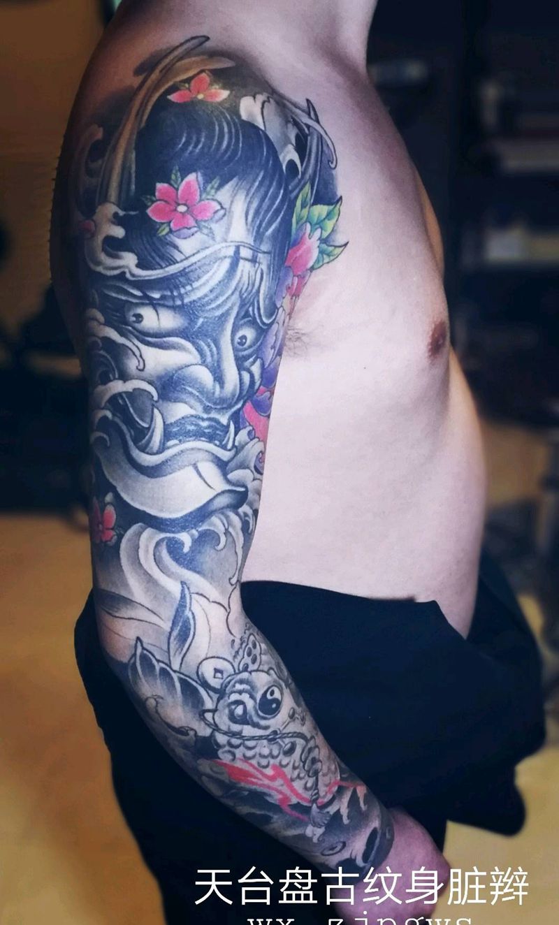 花臂纹身图片_手臂欧美传统天台盘古盘古脏辫唇钉成品纹身图案