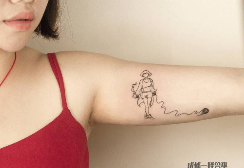 从容的女孩纹身图片