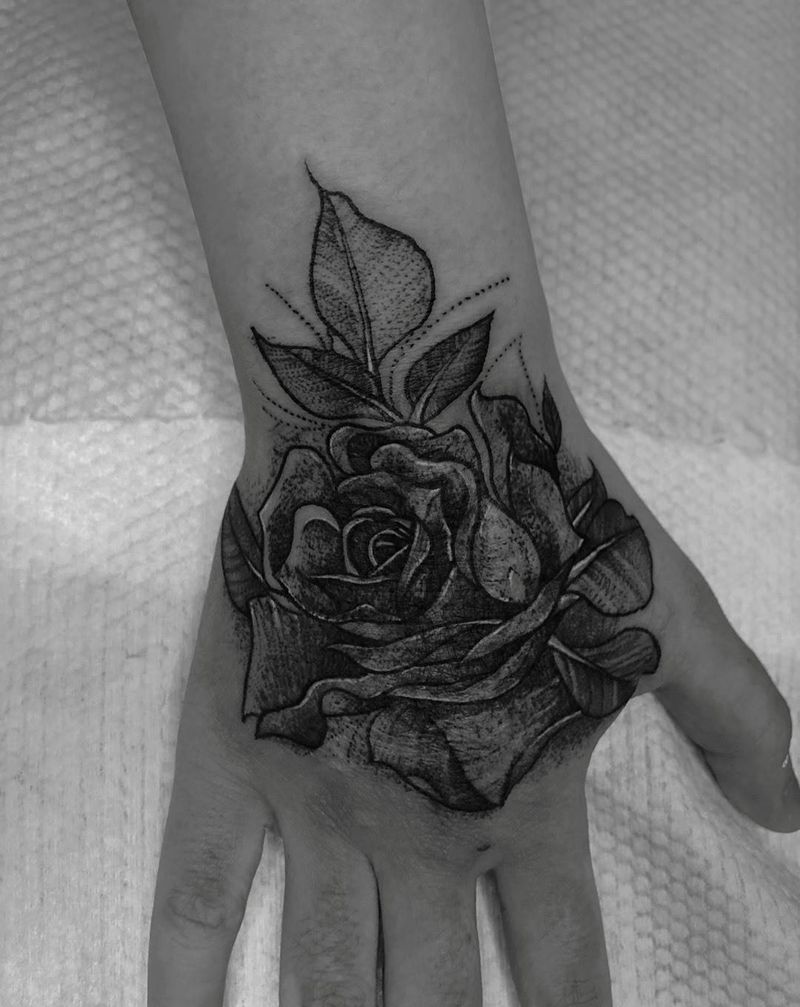 遮盖花纹身图片_手部点刺纹身图案