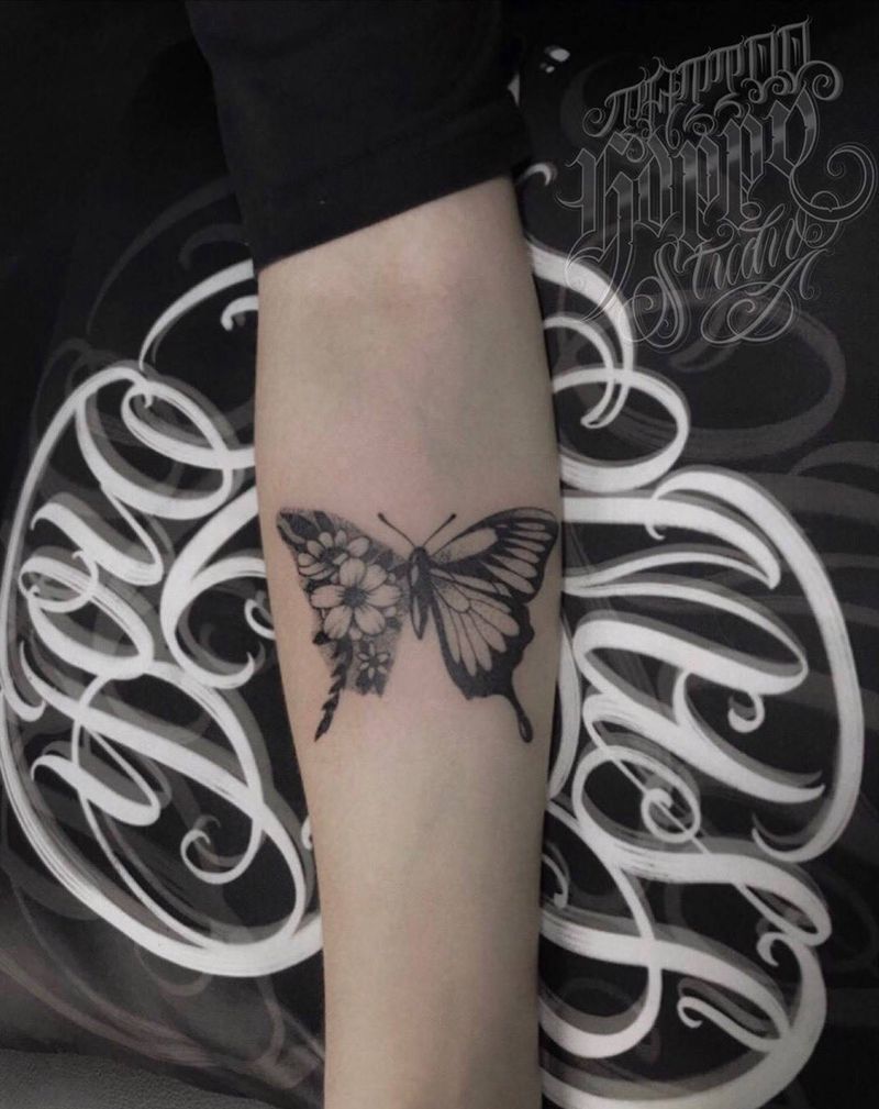 燕尾蝶纹身图片_手臂手部点刺纹身图案