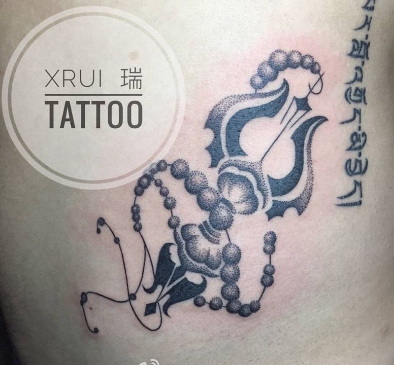 点刺纹身图片_成品腹部清新传统点刺宗教纹身图案