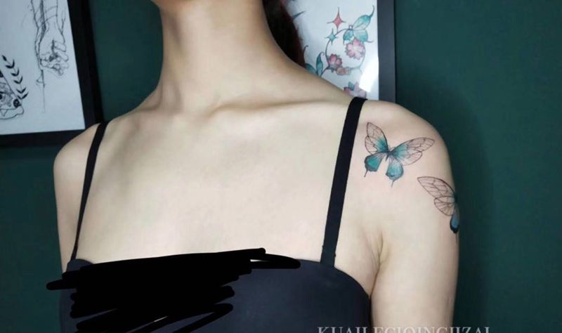 蝴蝶纹身图片_手臂水彩纹身图案