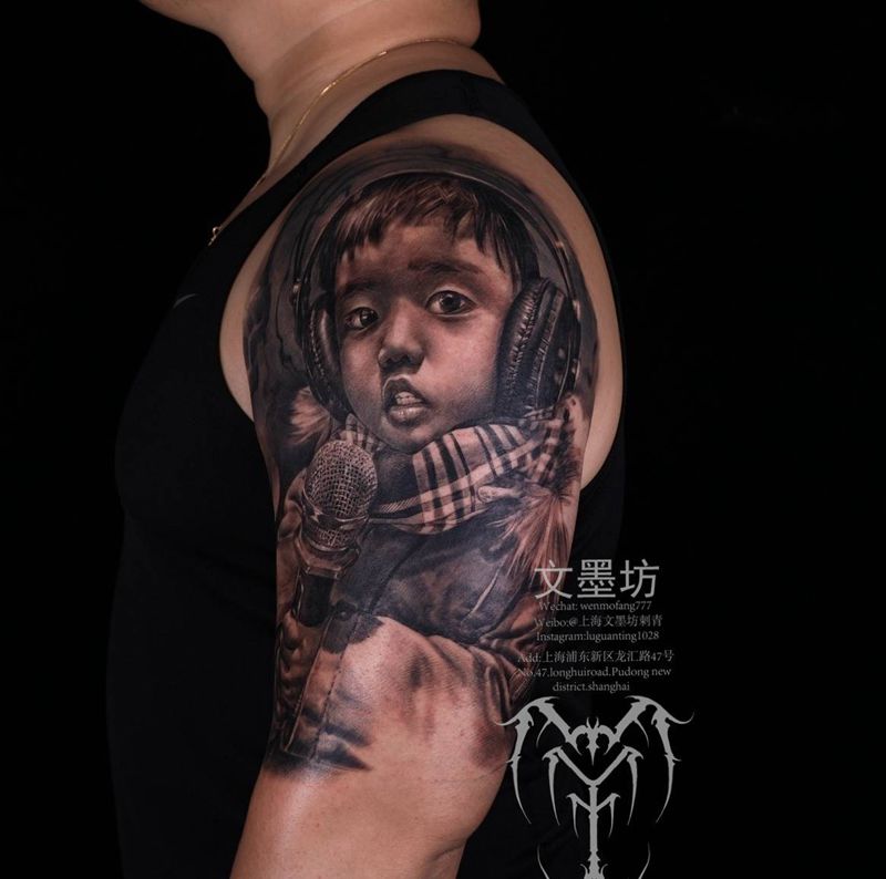 孩子肖像纹身图片_肩部手臂欧美写实纹身图案