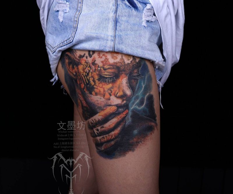女人纹身图片_臀部腿部欧美写实纹身图案