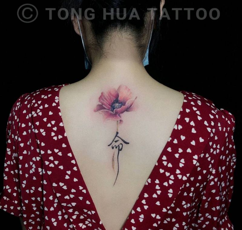 花与书法纹身图片_背部水彩纹身图案