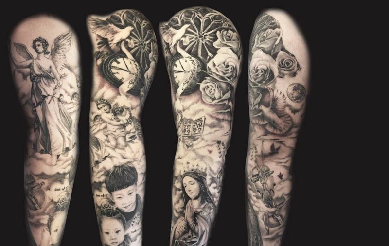 花臂纹身图片_手臂手部欧美写实圣母肖像钟表玫瑰纹身图案
