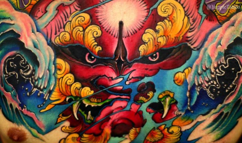 彩色花胸唐狮纹身图片