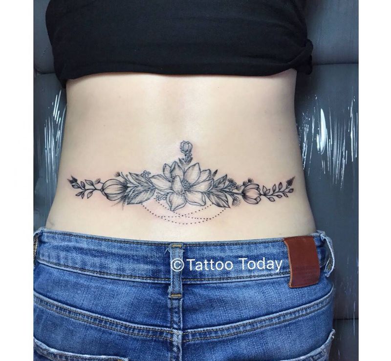 蔓延至后腰纹身图片_成品植物图腾背部腰部纹身图案