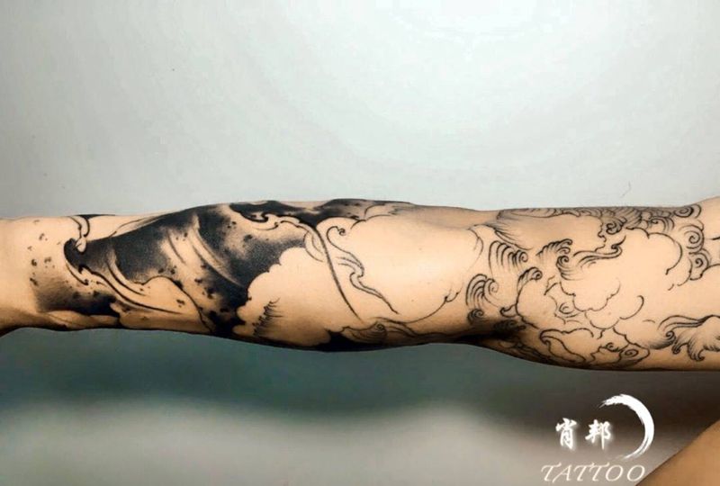 花臂未完待续纹身图片