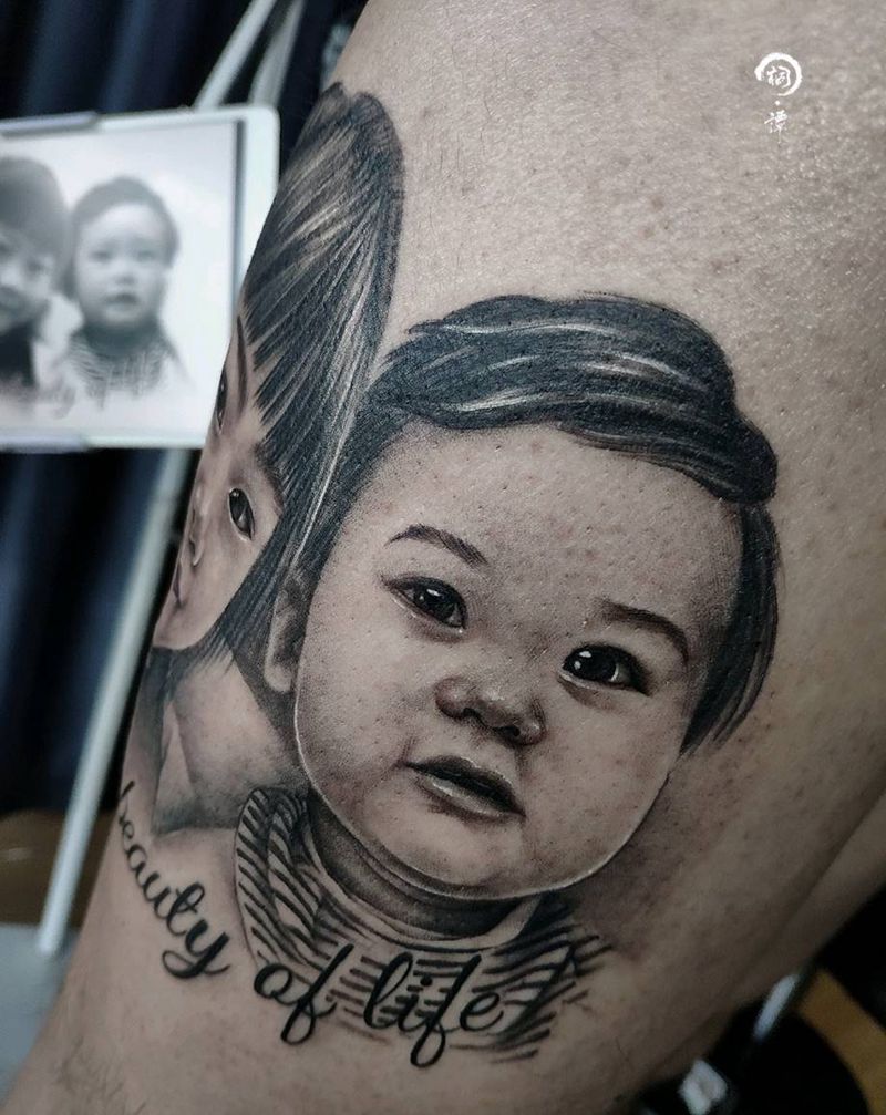 儿女双全纹身图片_腿部欧美写实纹身图案