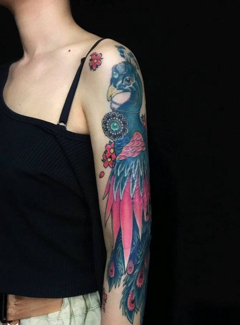 孔雀纹身图片_手臂纹身图案