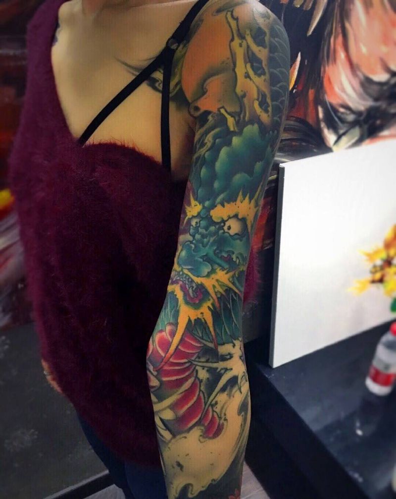 美女花臂纹身图片_成品手臂传统动物纹身图案