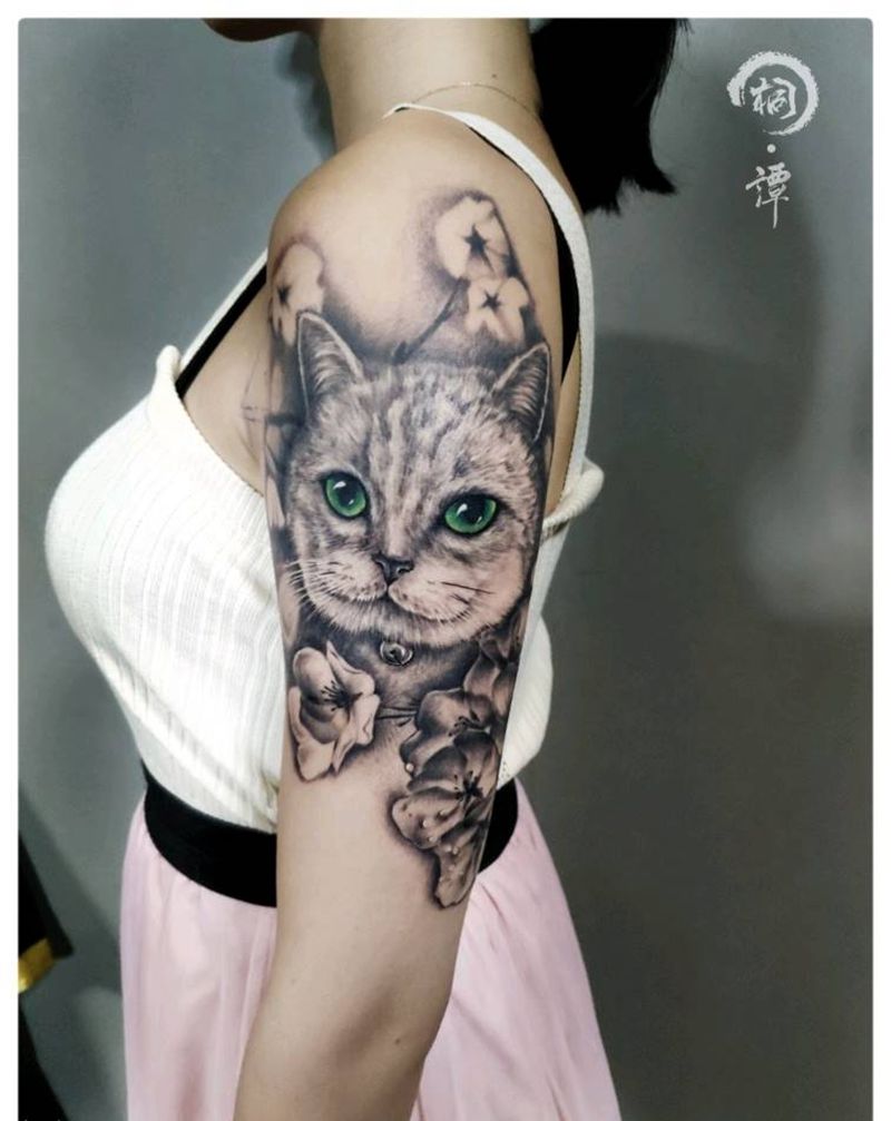 宠物猫纹身图片_手臂欧美写实纹身图案