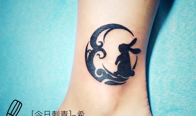兔子纹身图片_成品腿部图腾纹身图案