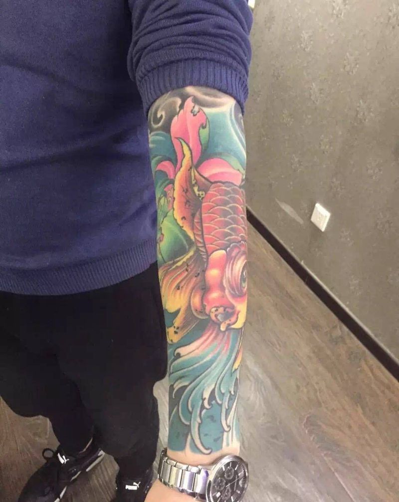 传统鱼纹身图片_成品手臂传统动物纹身图案