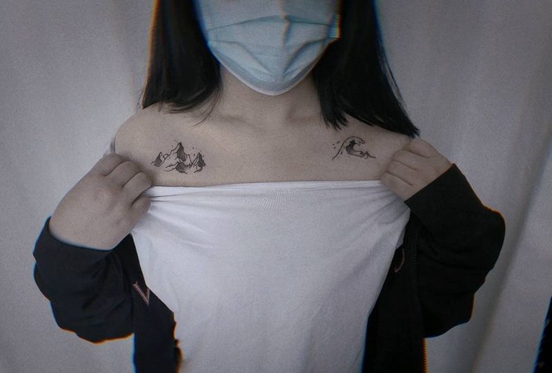 山海纹身图片_胸部点刺山海纹身图案