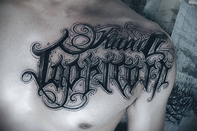 花体✍️纹身图片_胸部花体字图腾纹身图案
