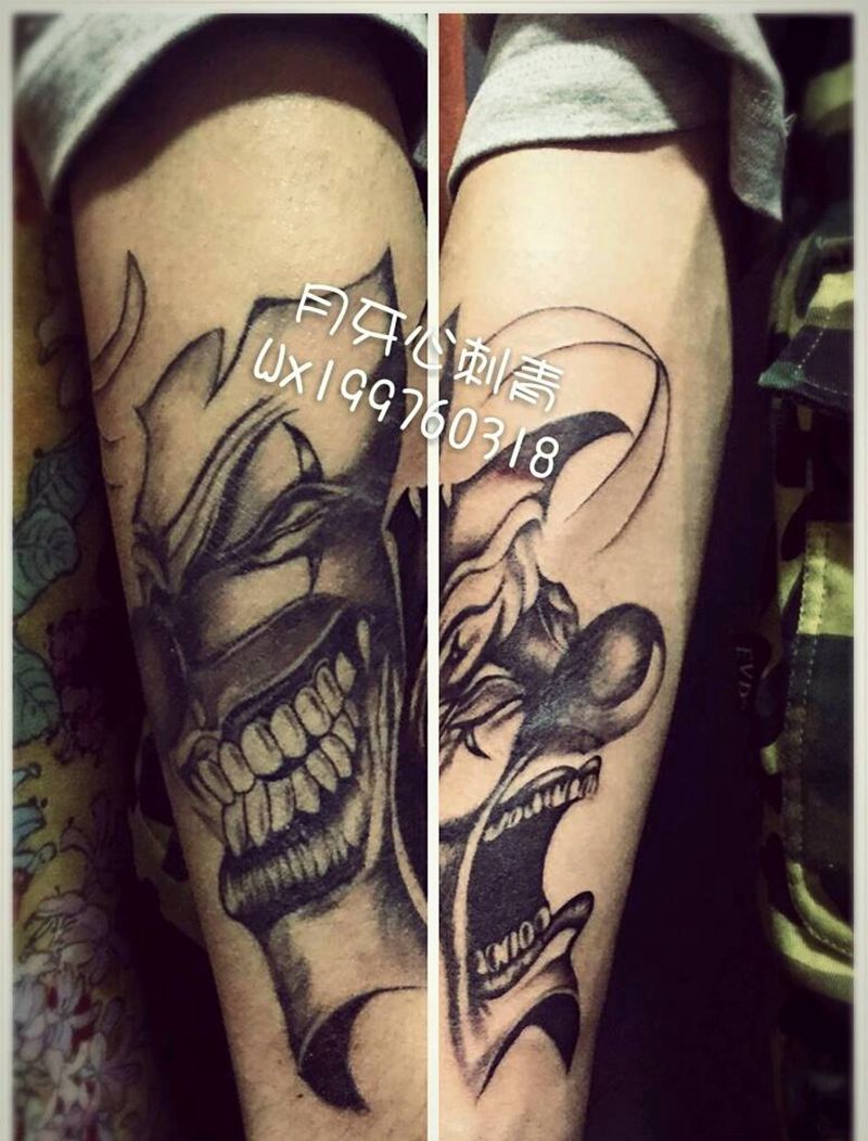 小丑纹身图片_成品手臂欧美人物小丑哭笑面具纹身图案