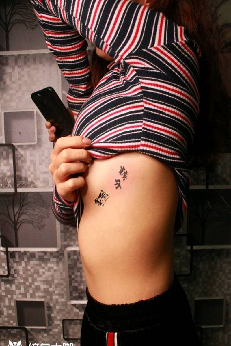 糖分纹身图片_胸部纹身图案