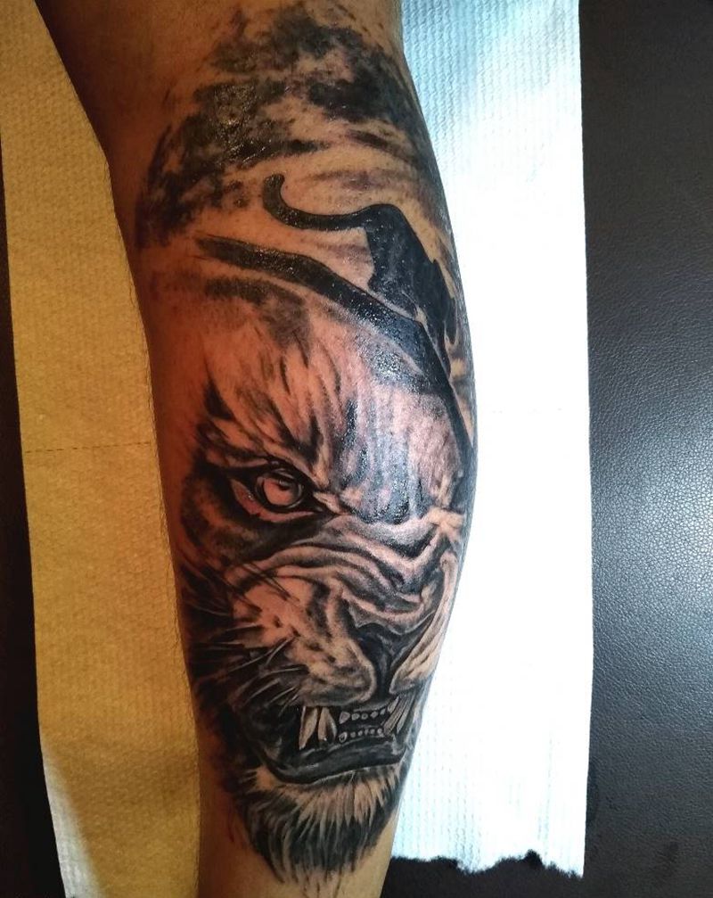 小腿猛兽纹身图片_腿部欧美写实纹身图案