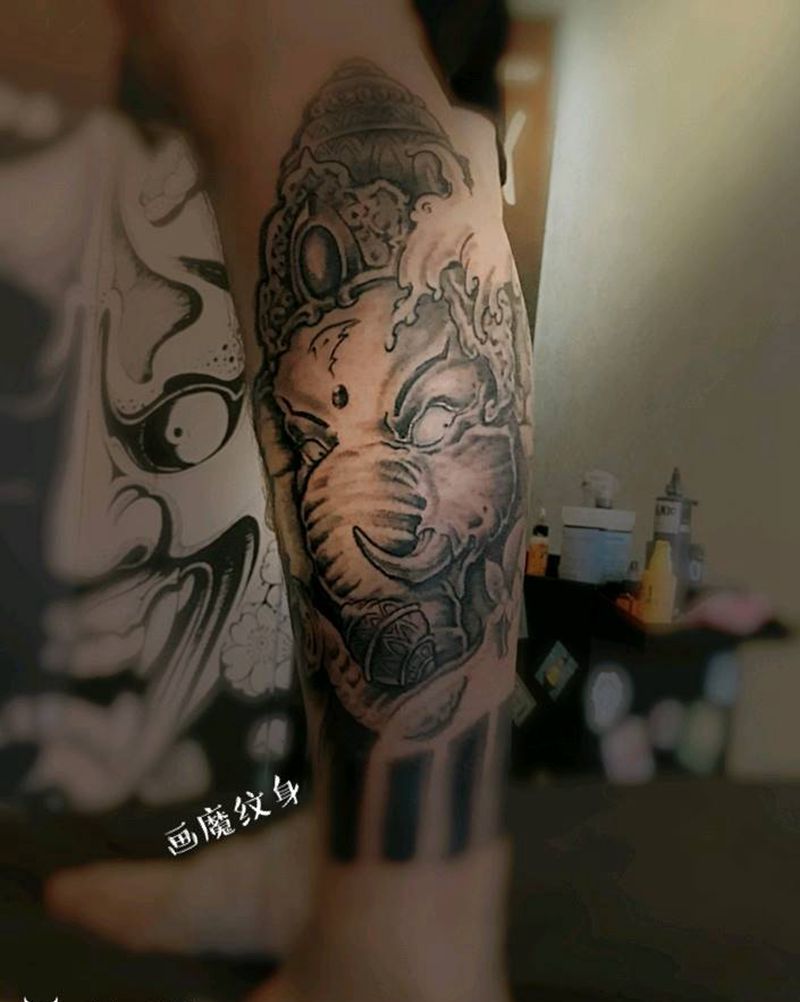 守护之神纹身图片_腿部新传统纹身图案