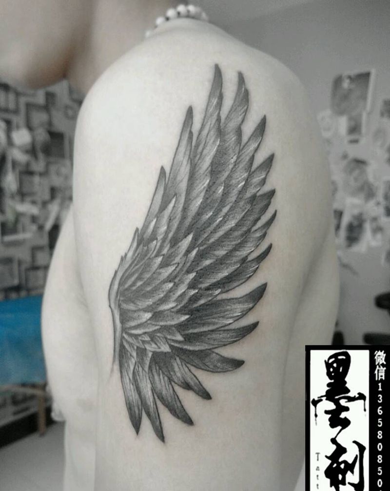 翅膀纹身图片_手臂纹身图案