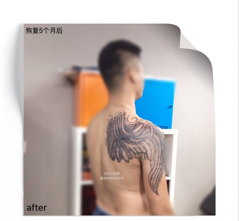 旧纹身遮盖纹身图片_背部手臂欧美写实翅膀旧遮盖纹身图案