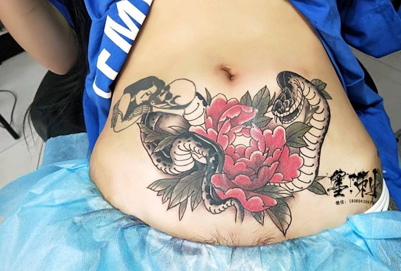 未完成纹身图片_腹部纹身图案