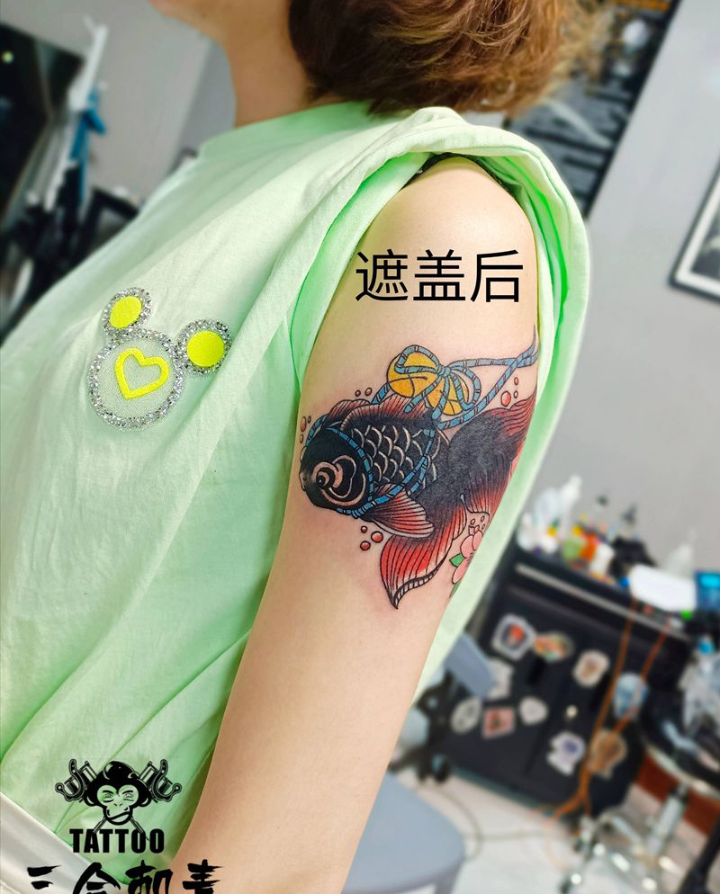遮盖锦鲤纹身图片_手臂纹身图案