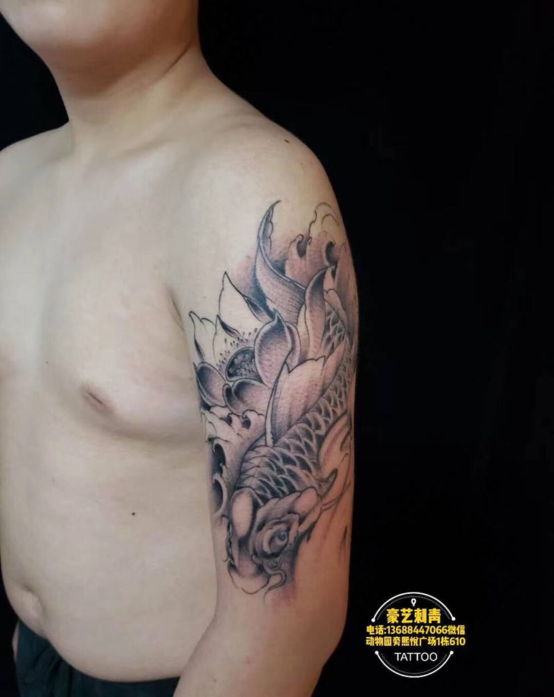 鱼纹身图片_手臂纹身图案