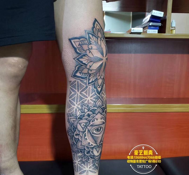 点刺纹身图片_腿部点刺纹身图案