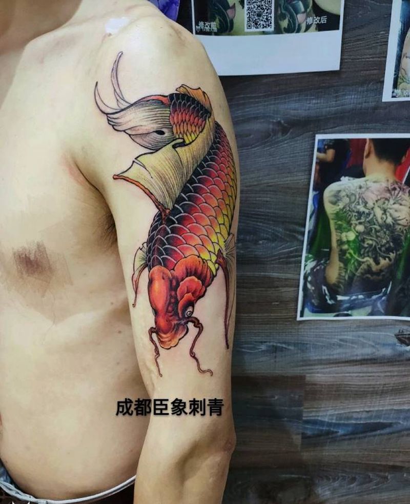 鱼纹身图片_手臂新传统纹身图案