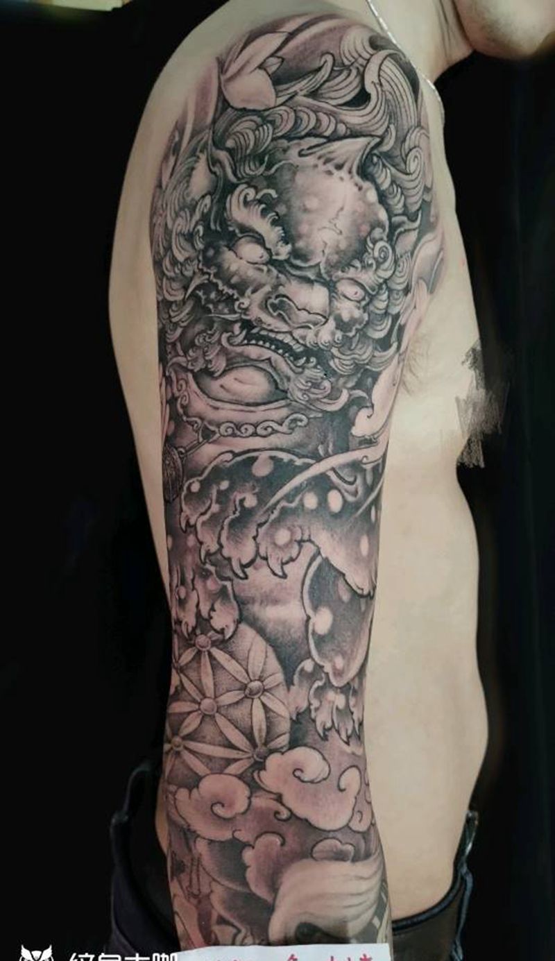 唐狮子纹身图片_手臂新传统纹身图案