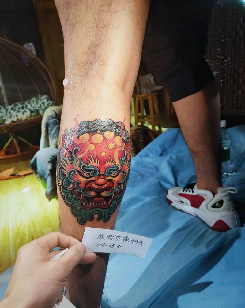 唐狮纹身图片_腿部新传统唐狮子纹身图案