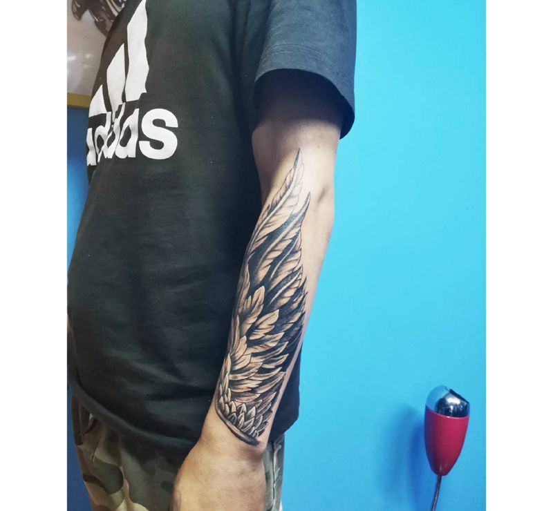 烟花遮盖纹身图片_手臂纹身图案