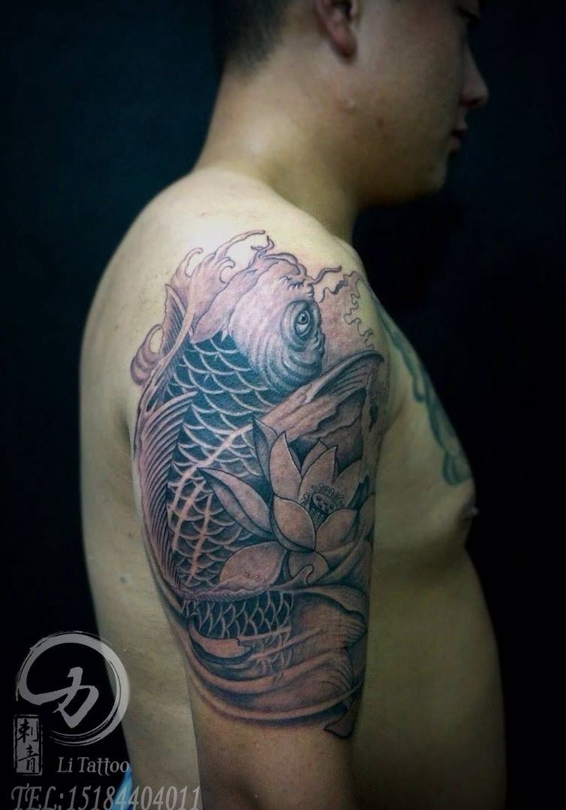 鱼纹身图片_成品手臂传统动物纹身图案