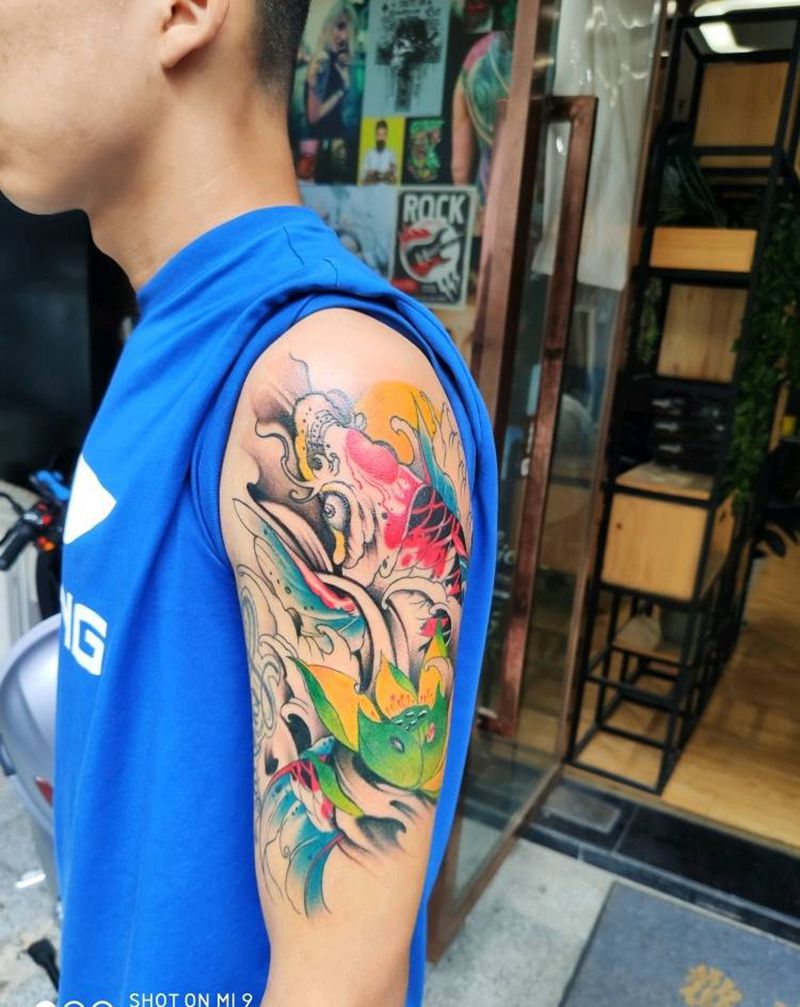 鲤鱼6小时纹身图片_手臂纹身图案