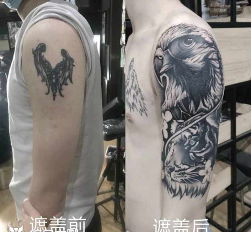 遮盖纹身图片_手臂欧美写实纹身图案