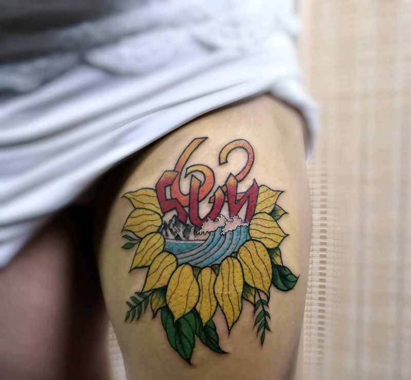 向日葵纹身图片_腿部纹身图案