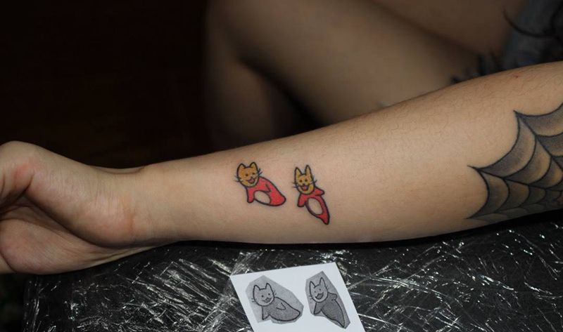 小猫鱼纹身图片_手部New School纹身图案