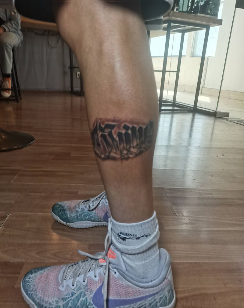 花体字纹身图片_腿部纹身图案