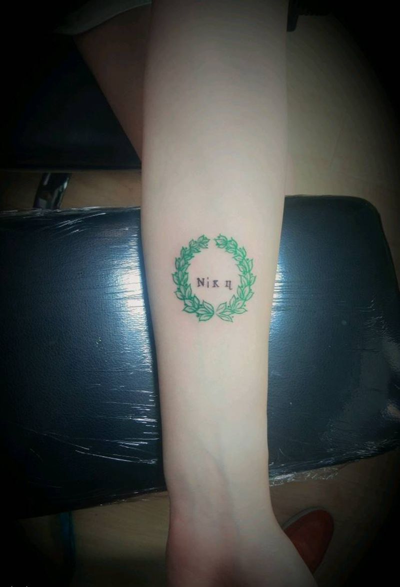 月桂花环纹身图片_手臂传统清新纹身图案