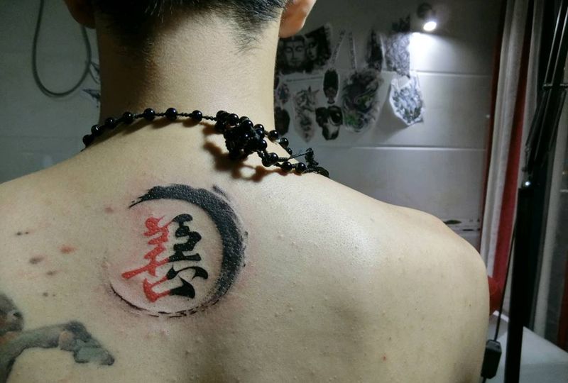 善恶纹身图片_颈部背部水墨纹身图案