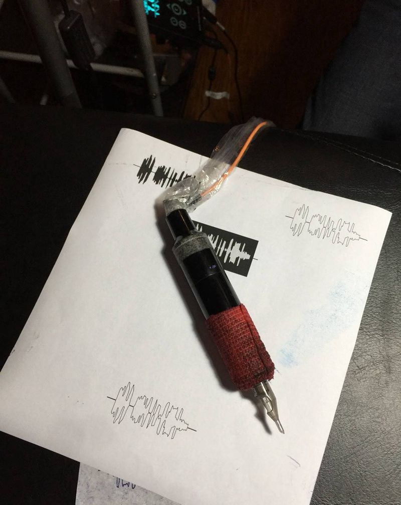 自己女儿的歌声纹身图片_成品手臂清新欧美写实几何人物原创图腾纹身图案