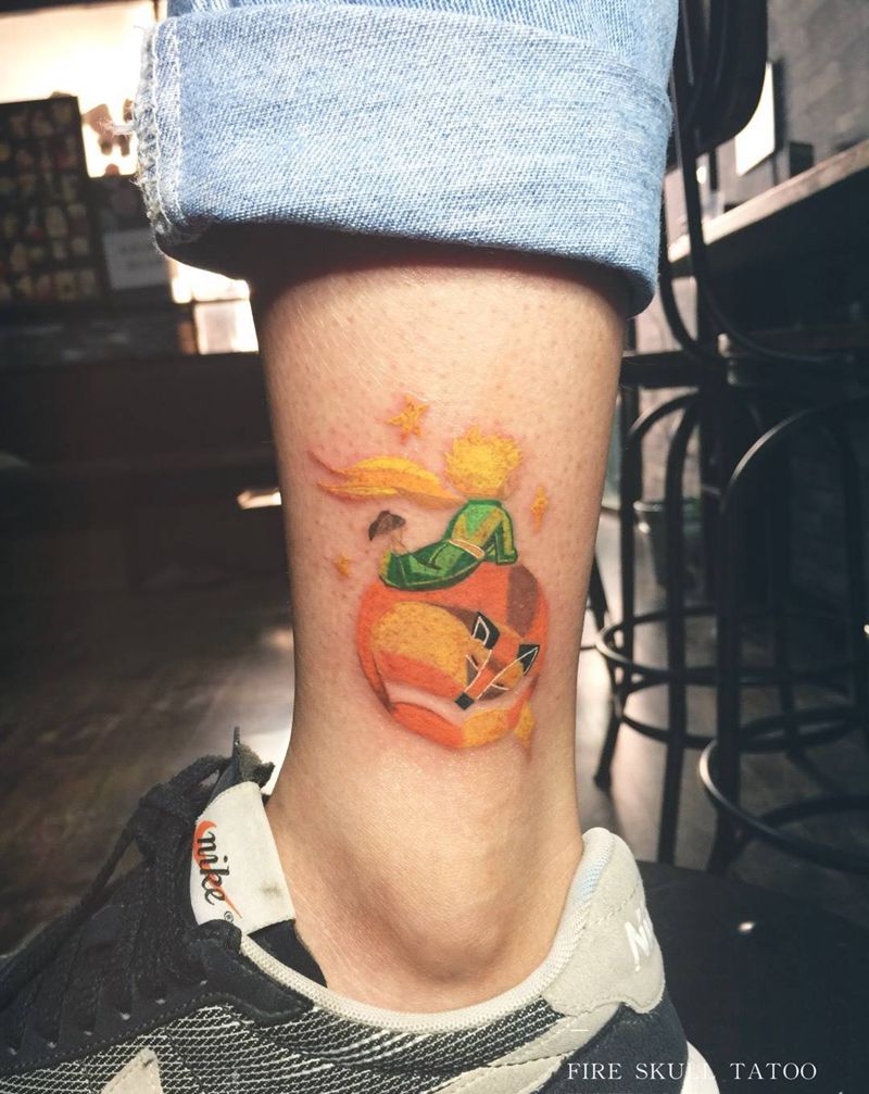 小王子纹身图片_成品手稿腿部脚部清新人物自贡火骷髅小王子纹身图案