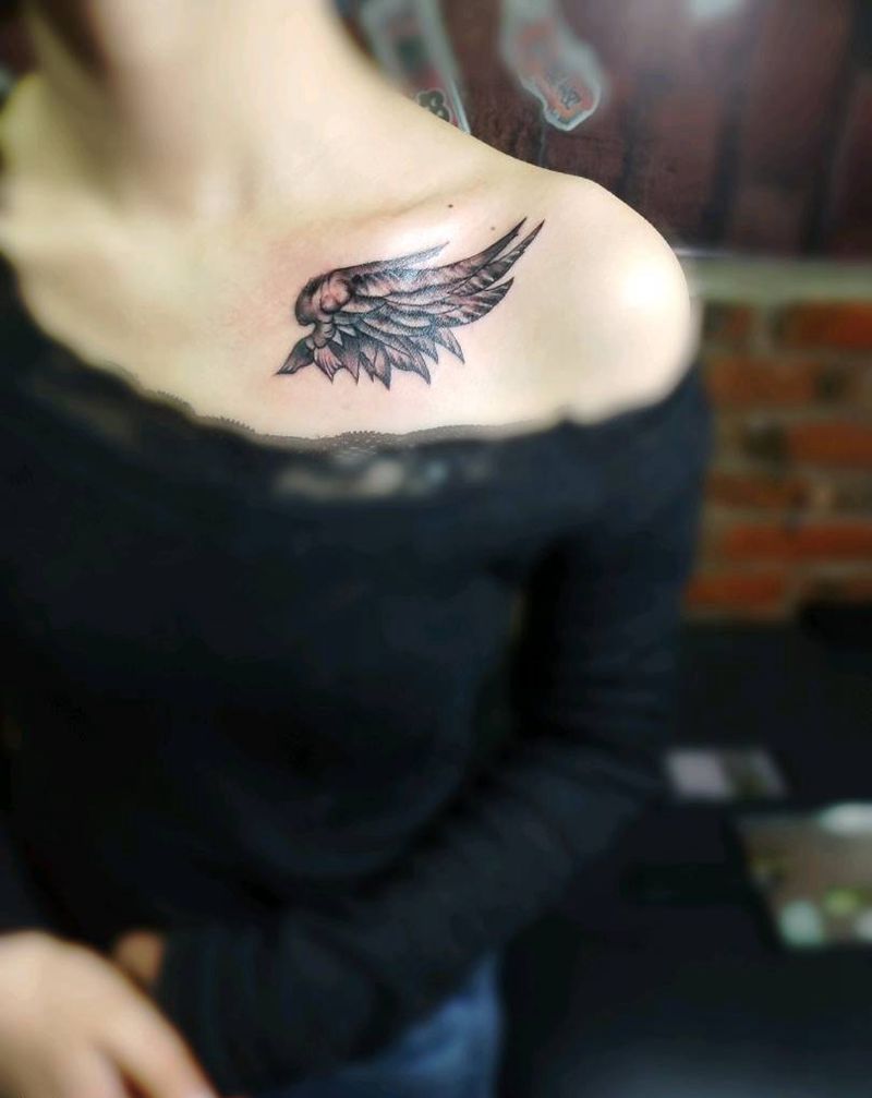 羽毛遮盖纹身图片