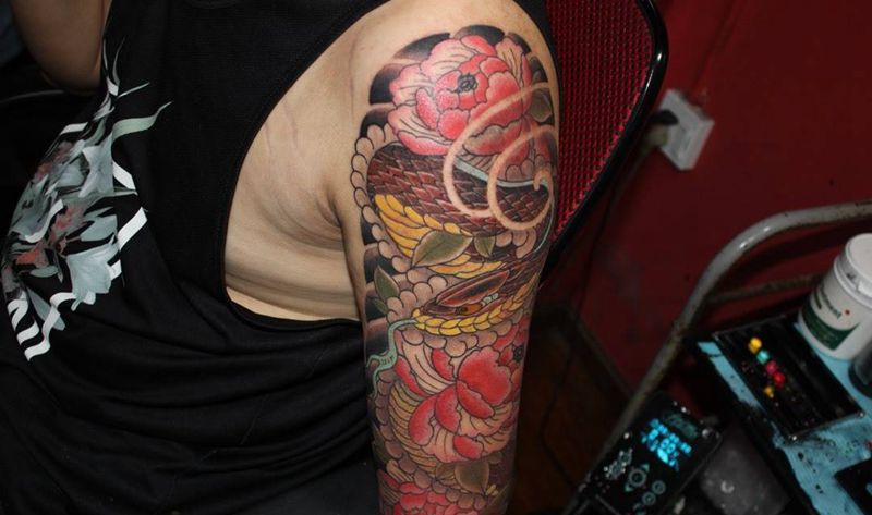 传统蛇牡丹纹身图片