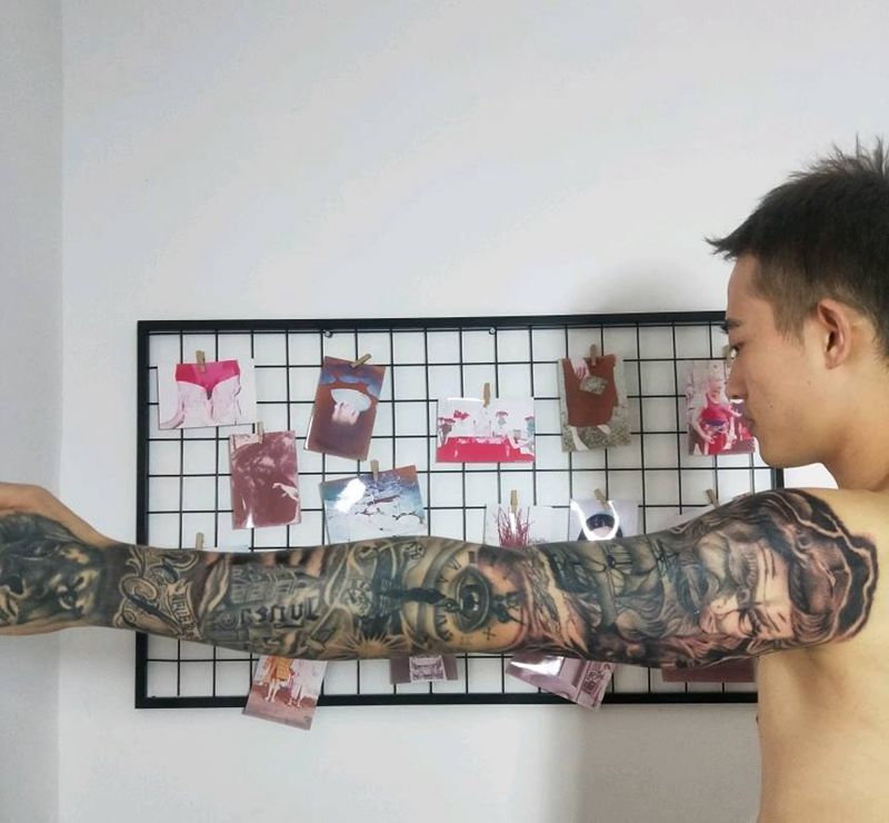 欧美写实花臂纹身图片_手臂欧美写实波塞冬玫瑰帆船灯塔纹身图案