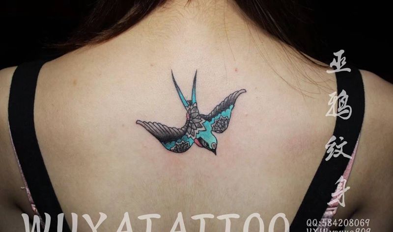 燕子耶稣天使纹身图片