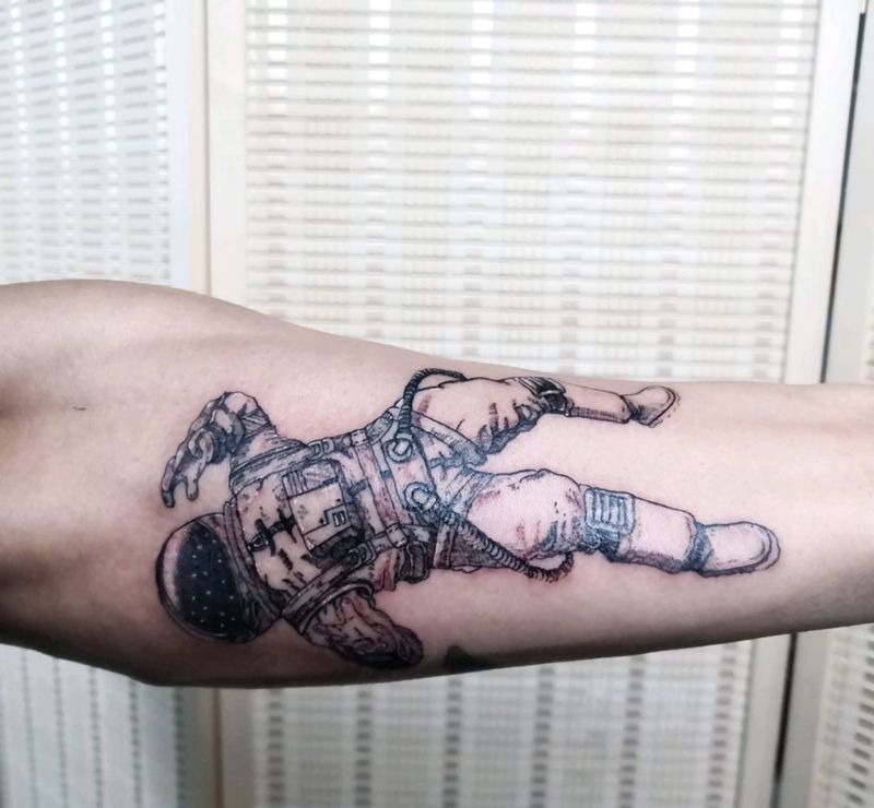 星际旅客纹身图片_手臂纹身图案